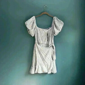 Trixxi light blue floral puff sleeve, front cross dresses woman’s size M‎ NWT